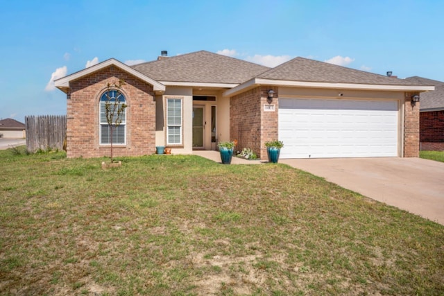 ranch-style house with a garage and a front lawn