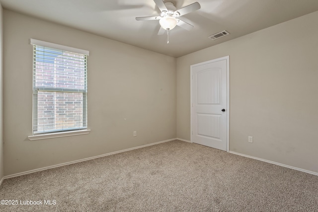 7905 Ave K, Lubbock, TX 79423 - spare room featuring carpet floors and a ceiling fan