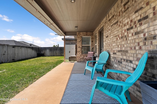 7905 Ave K, Lubbock, TX 79423 - fenced backyard featuring a patio area
