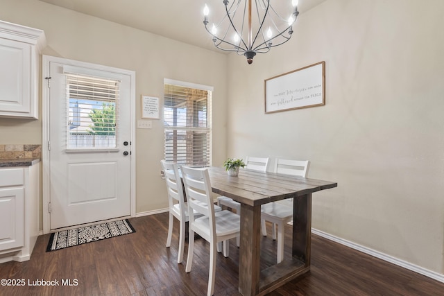 7905 Ave K, Lubbock, TX 79423 - dining area with a chandelier and dark wood finished floors