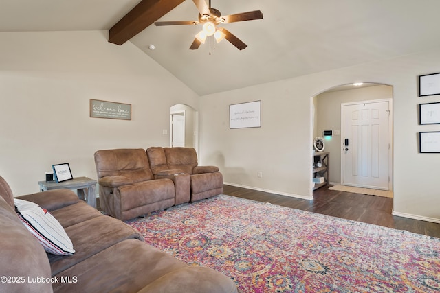 7905 Ave K, Lubbock, TX 79423 - living room with arched walkways, ceiling fan, and wood finished floors