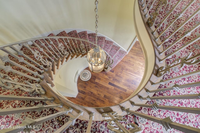 4204 89th St, Lubbock, TX 79423 - stairs with wood finished floors and baseboards