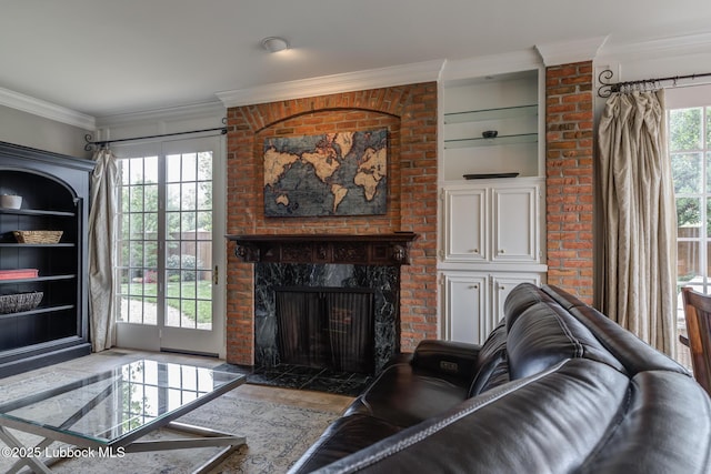 4204 89th St, Lubbock, TX 79423 - living area featuring crown molding, a fireplace, and built in features