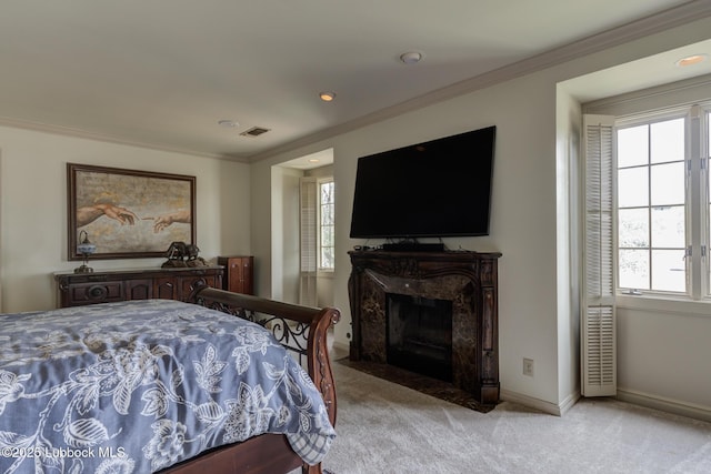 4204 89th St, Lubbock, TX 79423 - bedroom with light carpet, ornamental molding, multiple windows, a high end fireplace, and baseboards