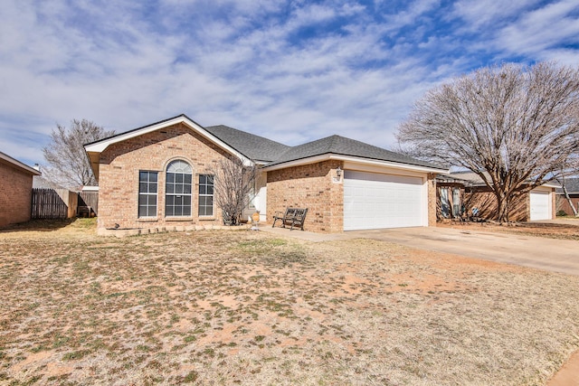 single story home featuring a garage