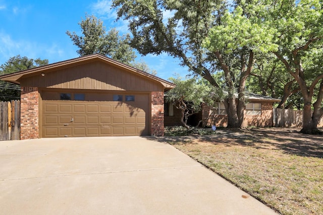 single story home with a garage