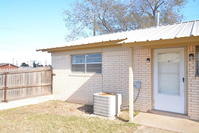 property entrance featuring central AC