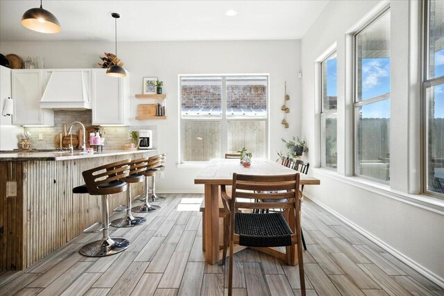7502 103rd St, Lubbock, TX 79424 - dining space featuring light wood-style flooring