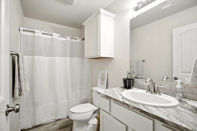 7502 103rd St, Lubbock, TX 79424 - bathroom with vanity and a shower with shower curtain