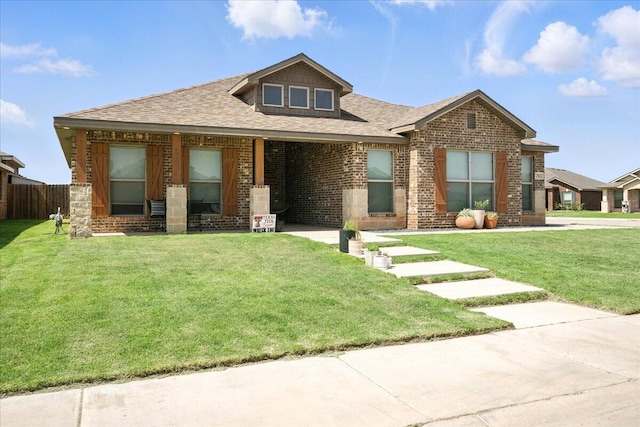 7502 103rd St, Lubbock, TX 79424 - view of front of house with brick siding and roof with shingles