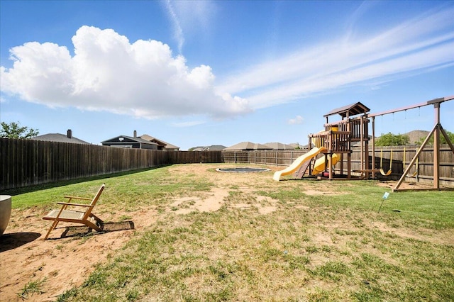 7502 103rd St, Lubbock, TX 79424 - fenced backyard with a playground