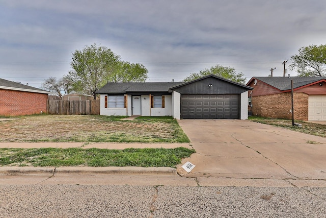 single story home featuring a garage