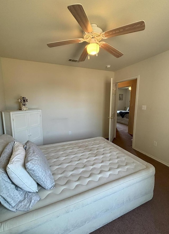 bedroom featuring carpet and ceiling fan