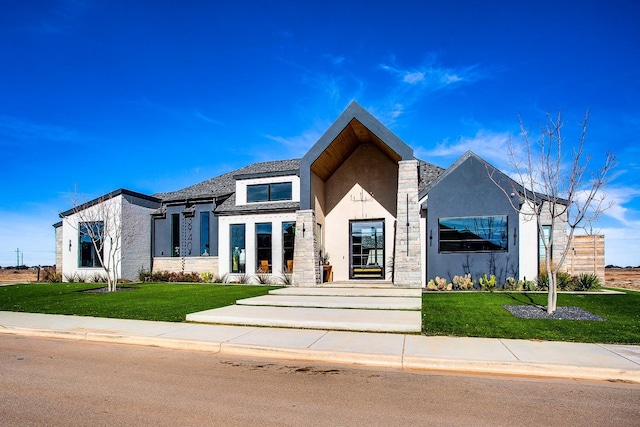 view of front of house with a front lawn