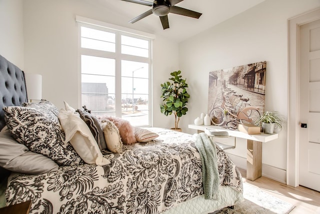 bedroom featuring ceiling fan and light wood-type flooring