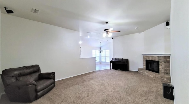 living area with baseboards, ceiling fan, a fireplace, and carpet