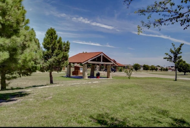 view of community featuring a gazebo and a yard