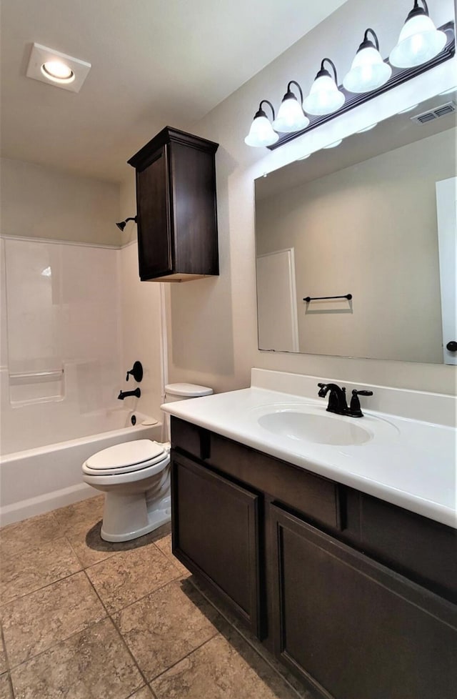 full bath with vanity, shower / bathing tub combination, tile patterned floors, toilet, and visible vents