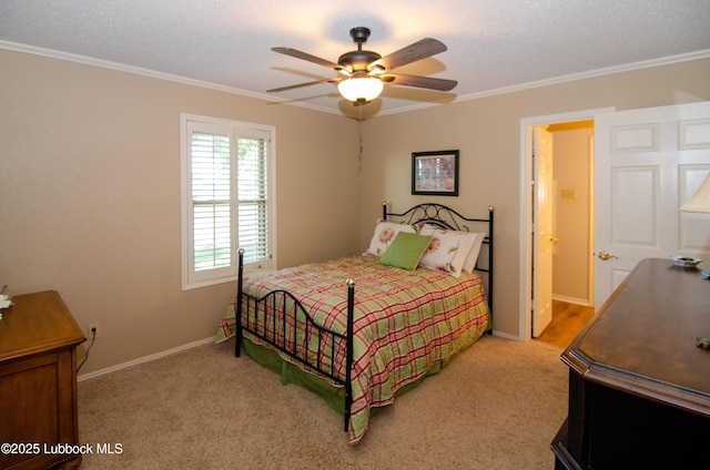 12220 Chicago Ave, Lubbock, TX 79424 - bedroom with ornamental molding, carpet flooring, a textured ceiling, and ceiling fan