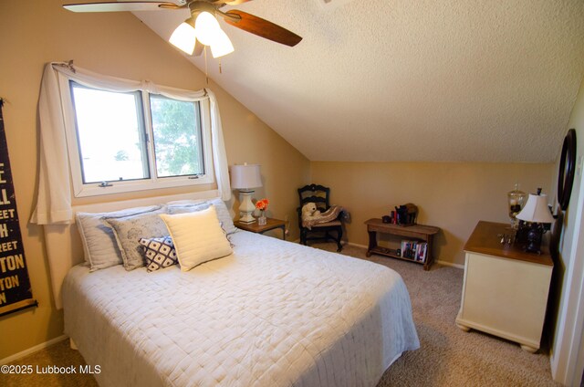 12220 Chicago Ave, Lubbock, TX 79424 - carpeted bedroom featuring lofted ceiling, a textured ceiling, and ceiling fan