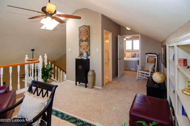 12220 Chicago Ave, Lubbock, TX 79424 - carpeted living room with vaulted ceiling and a ceiling fan