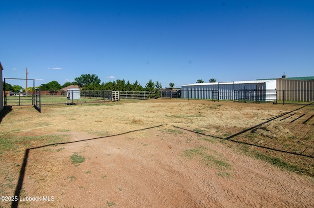 12220 Chicago Ave, Lubbock, TX 79424 - view of yard featuring an outbuilding, an exterior structure, and a pole building