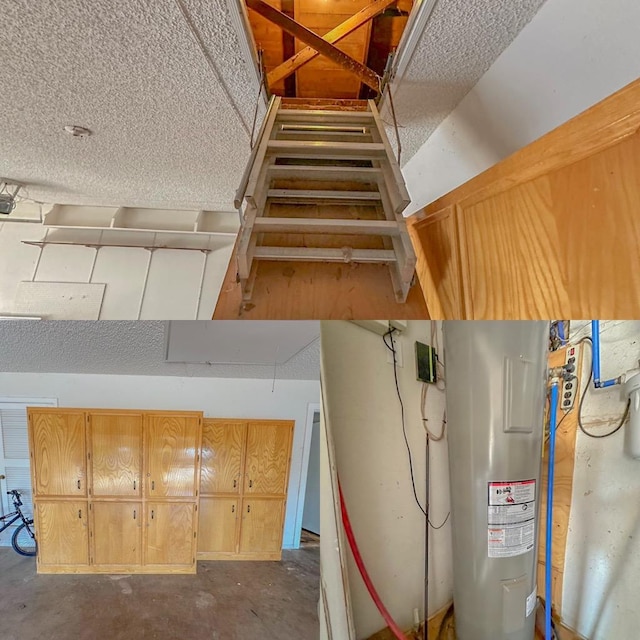 stairs featuring electric water heater and concrete floors