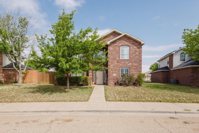 4906 Grinnell St, Lubbock, TX 79416 - traditional-style home featuring brick siding and cooling unit
