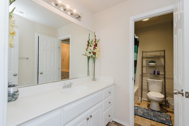 4906 Grinnell St, Lubbock, TX 79416 - full bathroom with toilet, vanity, and shower / bathtub combination with curtain