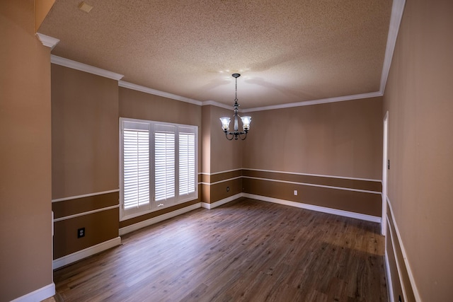 544 S US Highway 87, Wilson, TX 79381 - unfurnished room featuring an inviting chandelier, baseboards, a textured ceiling, and wood finished floors