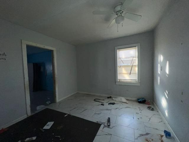 empty room with ceiling fan