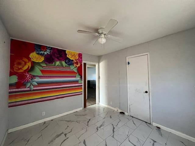 unfurnished bedroom with ceiling fan