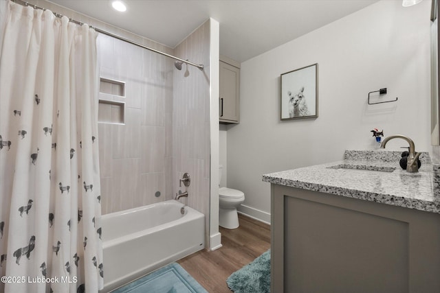 4724 121st Pl, Lubbock, TX 79424 - bathroom featuring toilet, wood finished floors, shower / tub combo with curtain, vanity, and baseboards