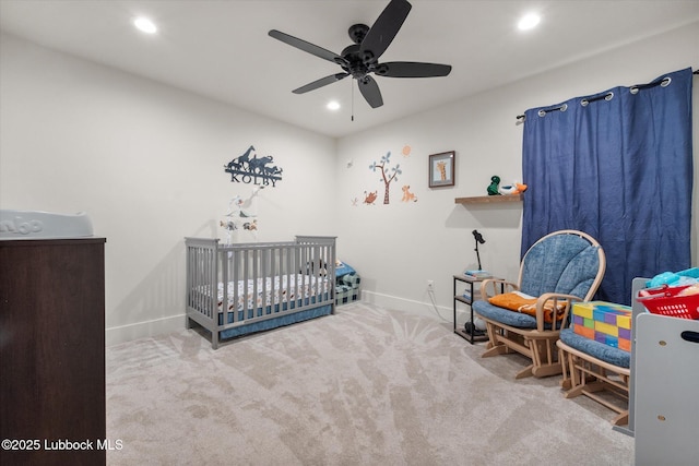 4724 121st Pl, Lubbock, TX 79424 - bedroom with carpet flooring, a nursery area, baseboards, recessed lighting, and ceiling fan