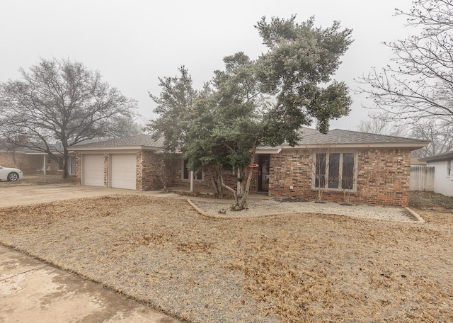 single story home with a garage