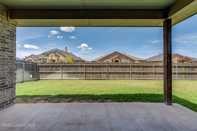136 Preston Hollow Ln, Wolfforth, TX 79382 - fenced backyard with a patio