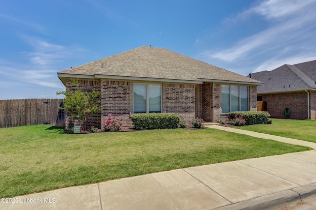 136 Preston Hollow Ln, Wolfforth, TX 79382 - view of front of house featuring brick siding and a shingled roof
