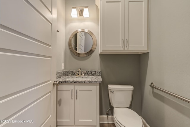 136 Preston Hollow Ln, Wolfforth, TX 79382 - half bathroom with toilet and vanity