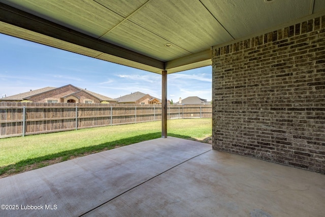 136 Preston Hollow Ln, Wolfforth, TX 79382 - fenced backyard with a patio area