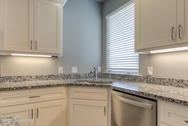 136 Preston Hollow Ln, Wolfforth, TX 79382 - kitchen with dishwasher, plenty of natural light, and white cabinets