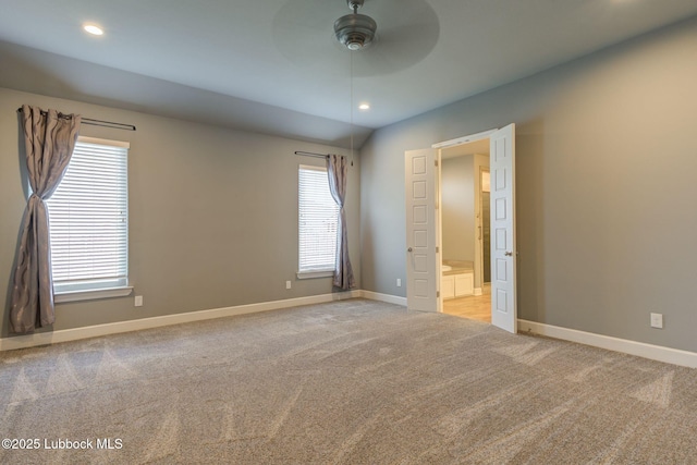 136 Preston Hollow Ln, Wolfforth, TX 79382 - unfurnished bedroom with light colored carpet, recessed lighting, and ensuite bathroom