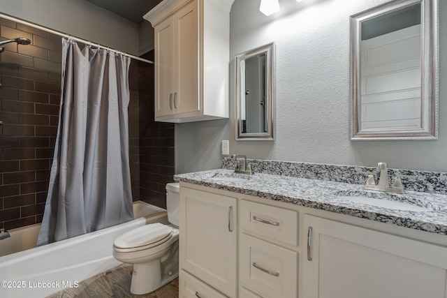 136 Preston Hollow Ln, Wolfforth, TX 79382 - full bath with double vanity, shower / tub combo, and wood finished floors