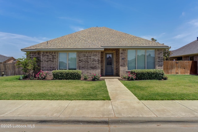 136 Preston Hollow Ln, Wolfforth, TX 79382 - view of front of property featuring brick siding and roof with shingles
