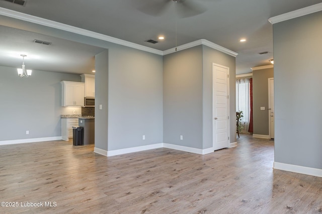 136 Preston Hollow Ln, Wolfforth, TX 79382 - unfurnished living room with ceiling fan, ornamental molding, light wood-style flooring, and recessed lighting