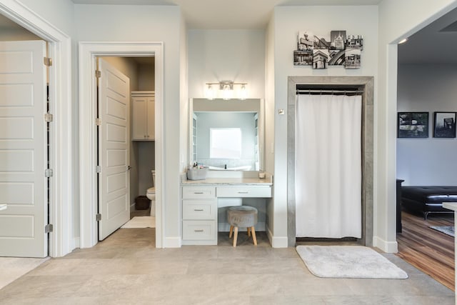 bathroom featuring toilet