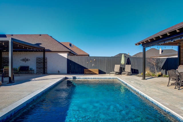 view of pool featuring a patio area