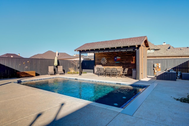 view of pool featuring a patio