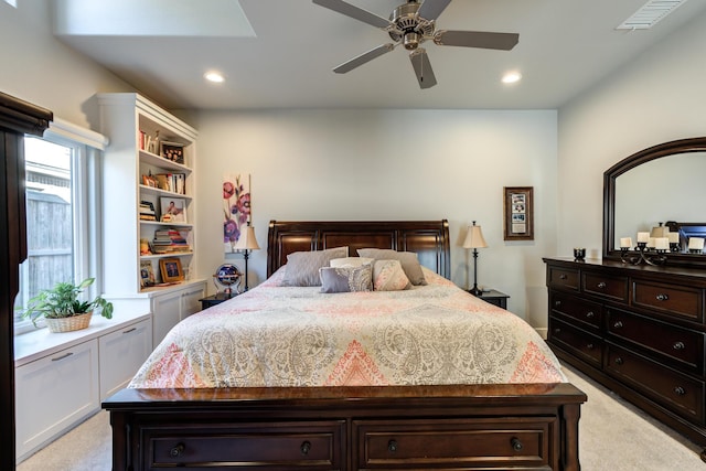 carpeted bedroom with ceiling fan