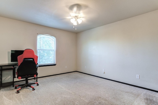 office area with ceiling fan and light colored carpet