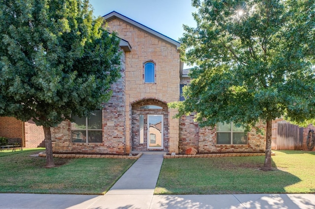 view of front of home featuring a front yard